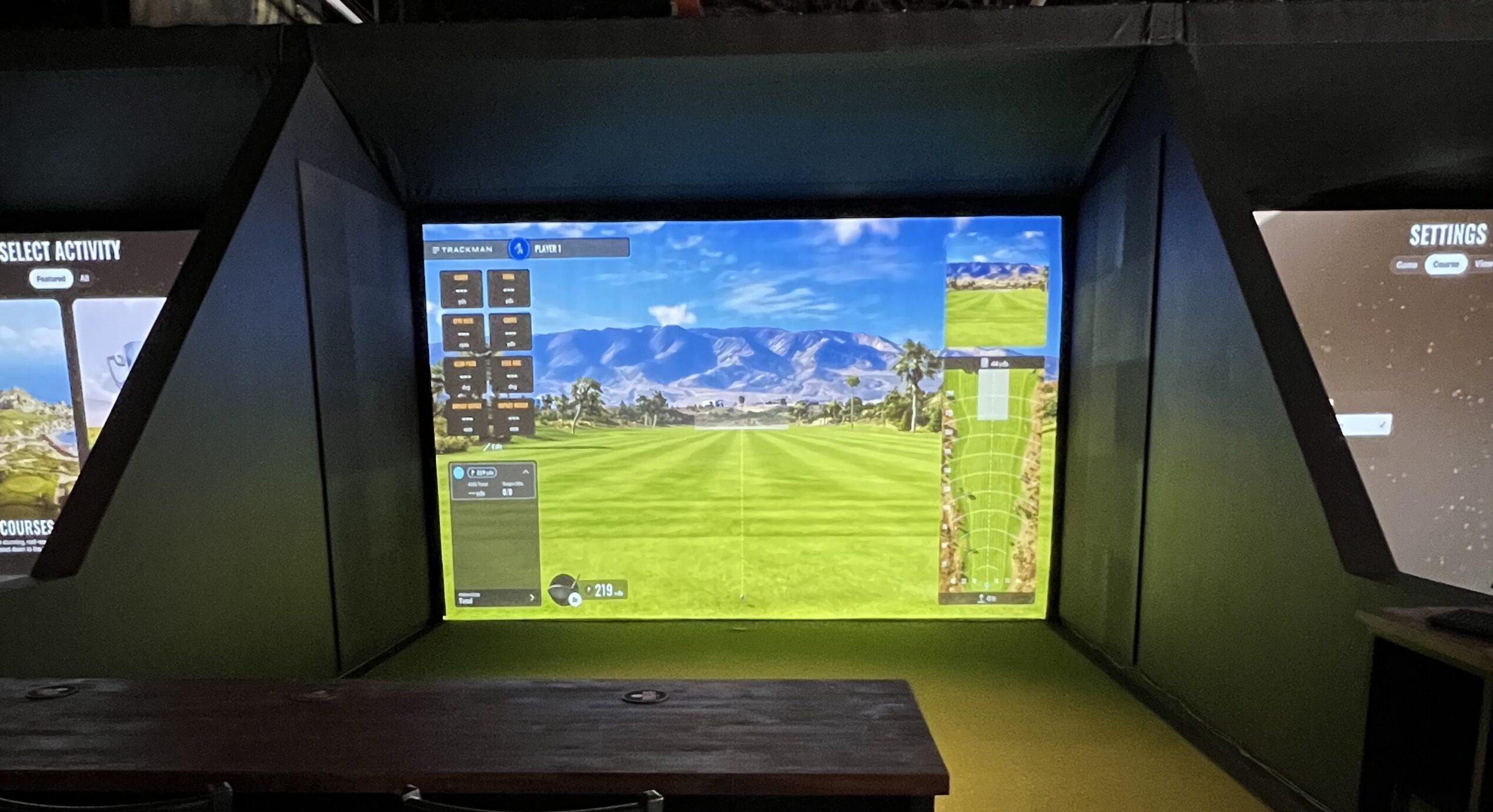 Golf simulator screen showing a virtual championship course at Endless 18